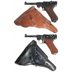 Two Luger Pistols with Holsters -A) DWM 1918 Production Luger Pistol