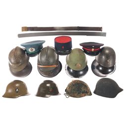 Assortment of Military Helmets, Hats, and Belts