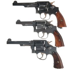 Three Smith & Wesson Double Action Revolvers -A) British Proofed Smith & Wesson Victory Model Double