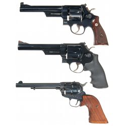 Three Revolvers -A) Smith & Wesson 1950 .45 Target Double Action Revolver