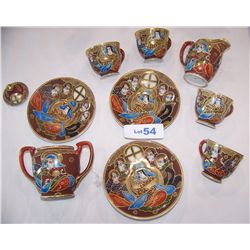 Eleven Pc. Samauri & Geisha Tea Service Set.