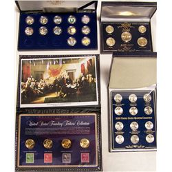 (4X$) COMMEMORATIVE QUARTER & DOLLAR SETS INCLUDING STAMPS & HOLOGRAM COLLECTIONS.