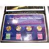 Image 4 : (4X$) COMMEMORATIVE QUARTER & DOLLAR SETS INCLUDING STAMPS & HOLOGRAM COLLECTIONS.