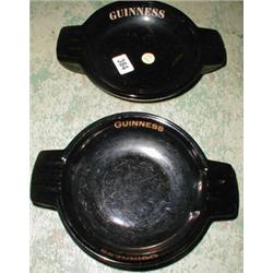 Two Guinness advertising ashtrays...