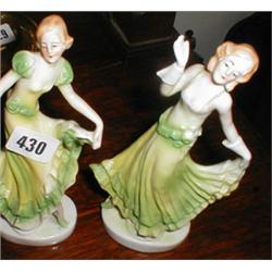 A pair of Art Deco porcelain figures...