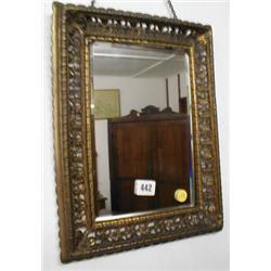 A C19th bevel edged mirror with pierced ca...