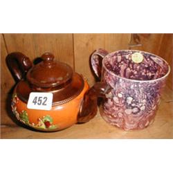 A C19th lustre-glazed terracotta tea pot w...