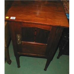 A c1900 oak Arts and Crafts pot cupboard w...