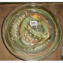 A studio pottery plate with fish decoratio...
