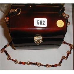 A Lucite barrel shapped handbag...