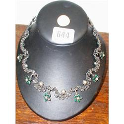 A c1930's necklace with green stone and pe...