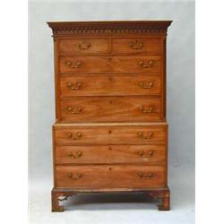 An early 19th century mahogany chest on c...