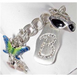 STERLING SILVER CHARM BRACELET - 1.16 OZ