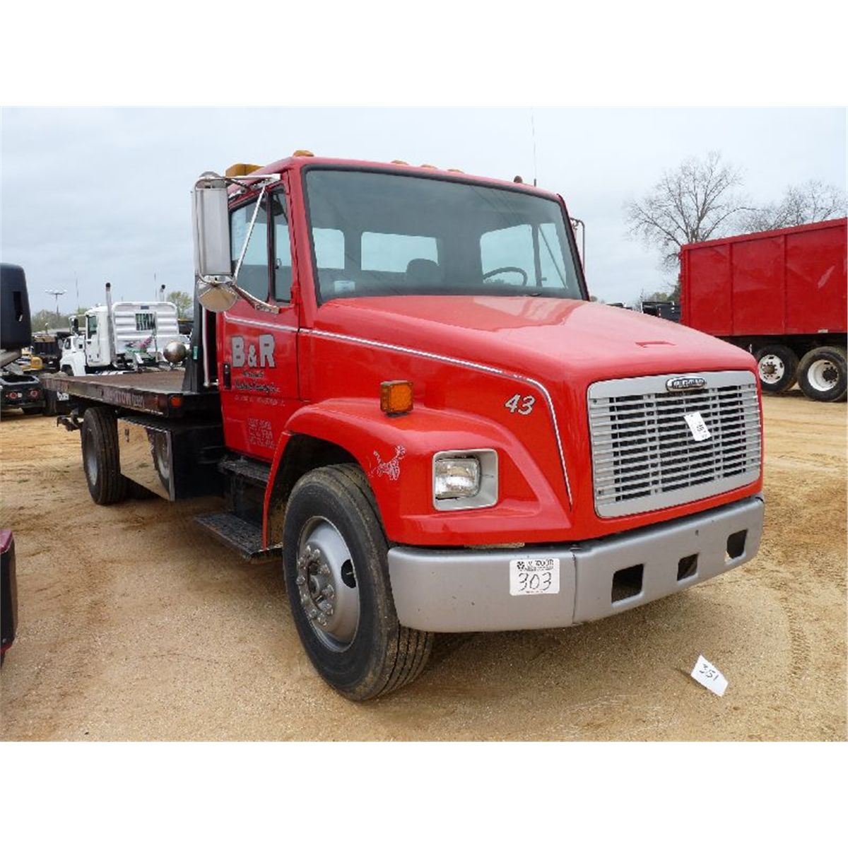 1999 FREIGHTLINER FL70 ROLLBACK TRUCK - J.M. Wood Auction Company, Inc.