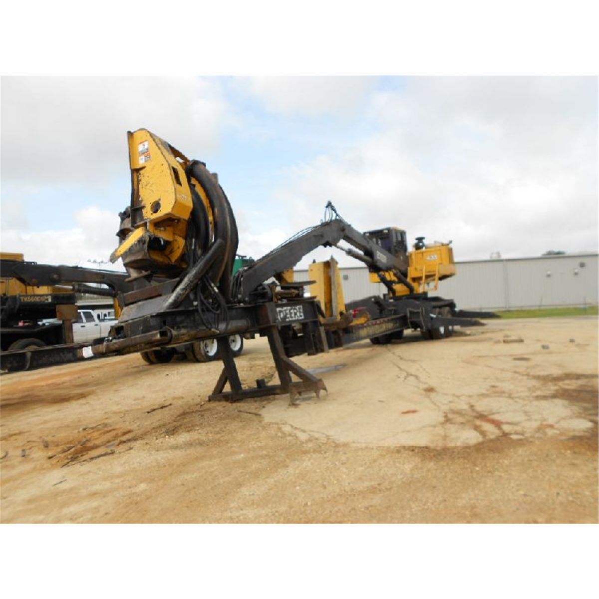 JOHN DEERE 435 LOG LOADER - J.M. Wood Auction Company, Inc.