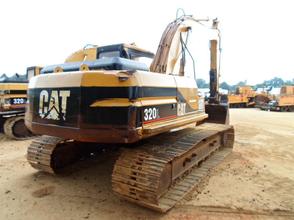 Cat320l CAT 320L HYDRAULIC EXCAVATOR - J.M. Wood Auction Company, Inc.