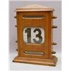 Image 1 : AN EDWARDIAN WALNUT DESK CALENDER, turned ...