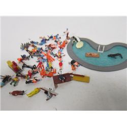 Bag full of assorted  tiny mini people