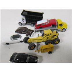 Lot of cars trucks and heavy equipment