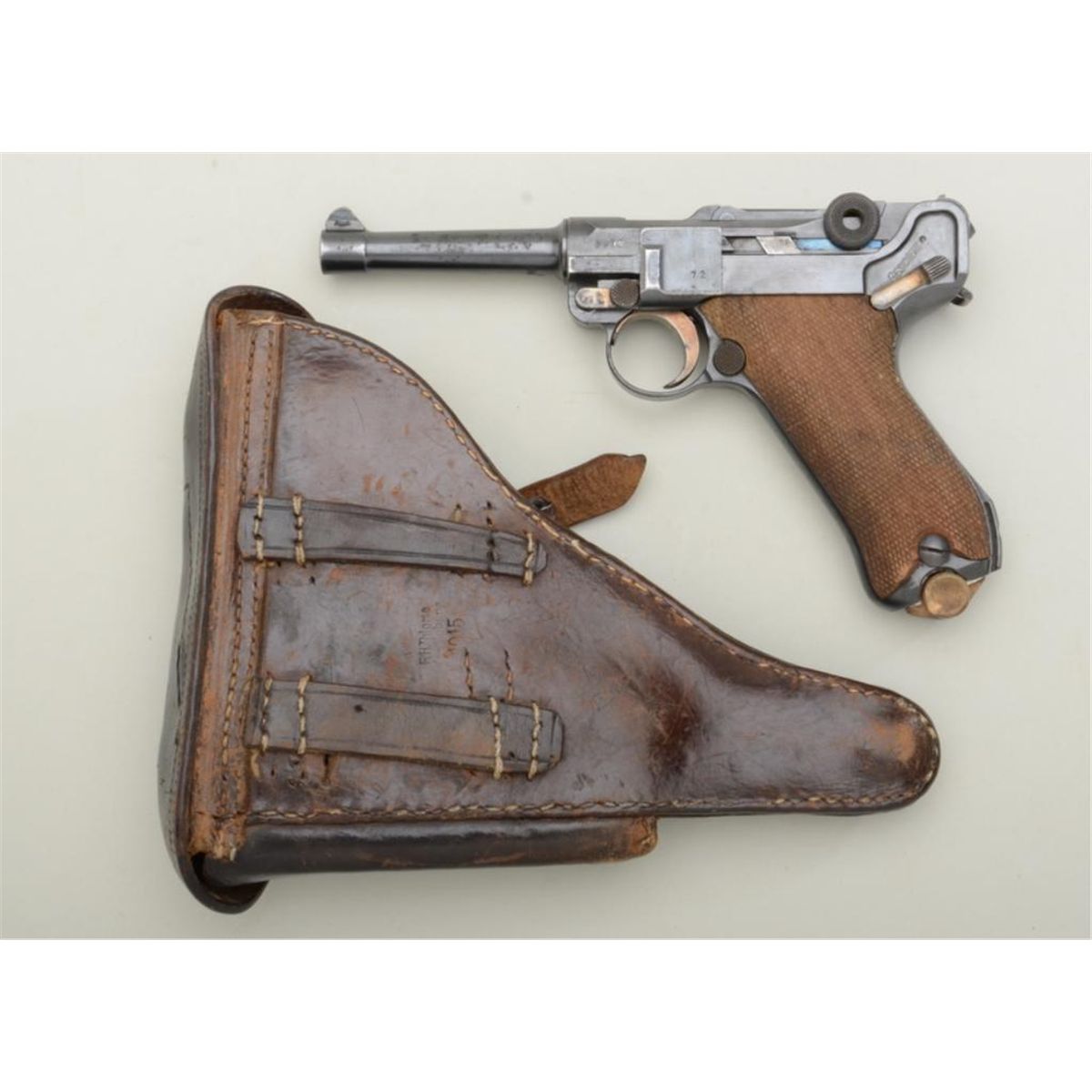 German Luger semi-auto pistol by DWM, marked 1917 on top of receiver ...