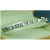 Image 1 : Exquisite 14 karat white gold ladies diamond  bracelet fine set with over 184 round and  baguette cu