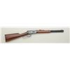 Image 1 : Winchester Model 94AE lever action SRC, .45  Colt cal., 16” barrel, blue finish, wood  stocks, #5461