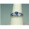 Image 1 : Terrific 14 karat white gold ladies ring set  with a combination of fine Tanzanite and  diamonds wei