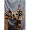 Image 2 : Classic Western high back saddle in overall  good condition showing re-covering of rear  cantle, no 