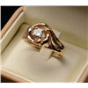 Image 1 : One men's' single diamond weighing 0.58ct set  in a free form setting.  Made in 14k yellow  gold.  E