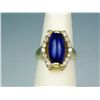 Image 1 : High quality 18 karat yellow gold ladies  custom design ring set with a fine blue  cabochon Lapis-La