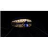 Image 1 : One ladies ring in 18k yellow gold set with  fine oval sapphire and baguette sapphire and  round dia