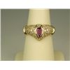 Image 1 : Exquisite 14 karat yellow gold ladies Cartier  inspired design ring bezel set with a pear  shape red