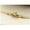 Image 1 : One fancy colored light green diamond  weighing 1.07ct in a solitaire ring made in  14k yellow gold.