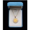 Image 1 : One 1/10 Krugerrand fine gold coin set in a  diamond bezel with a 14k chain (diamond wt  0.30ct).  E