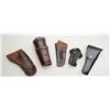 Image 1 : Lot of five misc. leather holsters and a pair  of studded leather cuffs; the cuffs are  modern and m