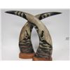 Image 1 : Pr carved horns with eagle design on wood bases