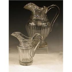 A late George III cut glass jug, the broad...