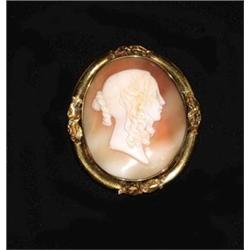 A Victorian shell cameo brooch carved with...