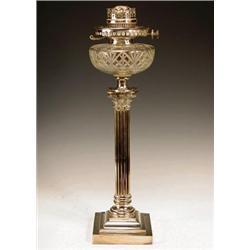An Edwardian electroplate oil lamp raised ...