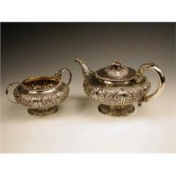 A William IV silver teapot by John Walton,...