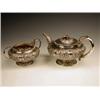 Image 1 : A William IV silver teapot by John Walton,...