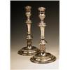 Image 1 : A pair of modern silver table candlesticks...