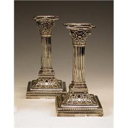 A pair of Victorian silver dwarf candlesti...