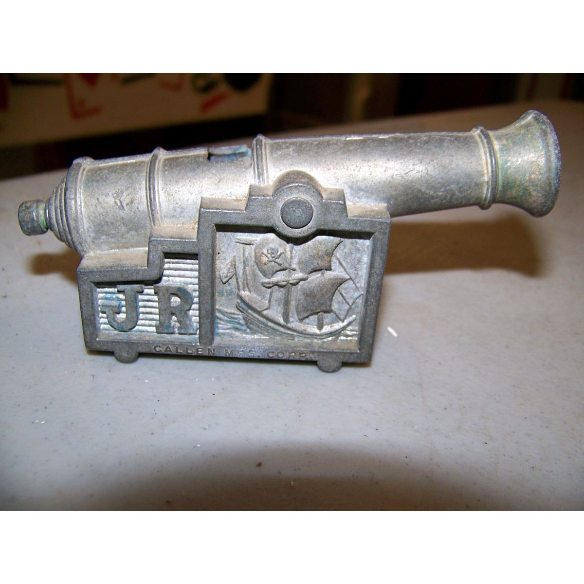 old cannon cap gun, 4.5"L, Pirate Ship embossed, marked JR, Maywood, Illinois, Callen Mfg. Corp.