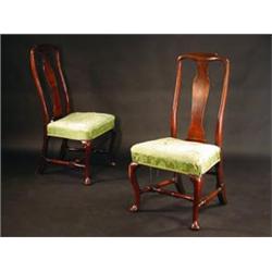 A pair of George I walnut dining chairs, e...