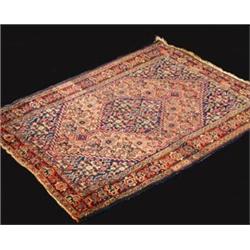A Senneh wool rug, the salmon pink field e...