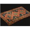 Image 1 : A Kazakh wool rug, the central midnight bl...