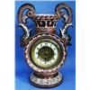 Image 1 : A Victorian majolica cased mantle clock.