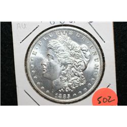 1885-O Silver Morgan $1, AU