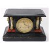 Image 1 : Antique mantle clock with black case and faux marble columns, lions head finials, includes key and i